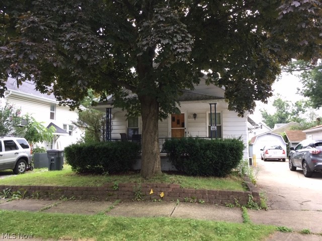 Tons of potential! Needs work to bring back original lustre. Beautiful woodwork. The oversized garage is a mechnics dream. Great opportunity for investors. Sold AS IS