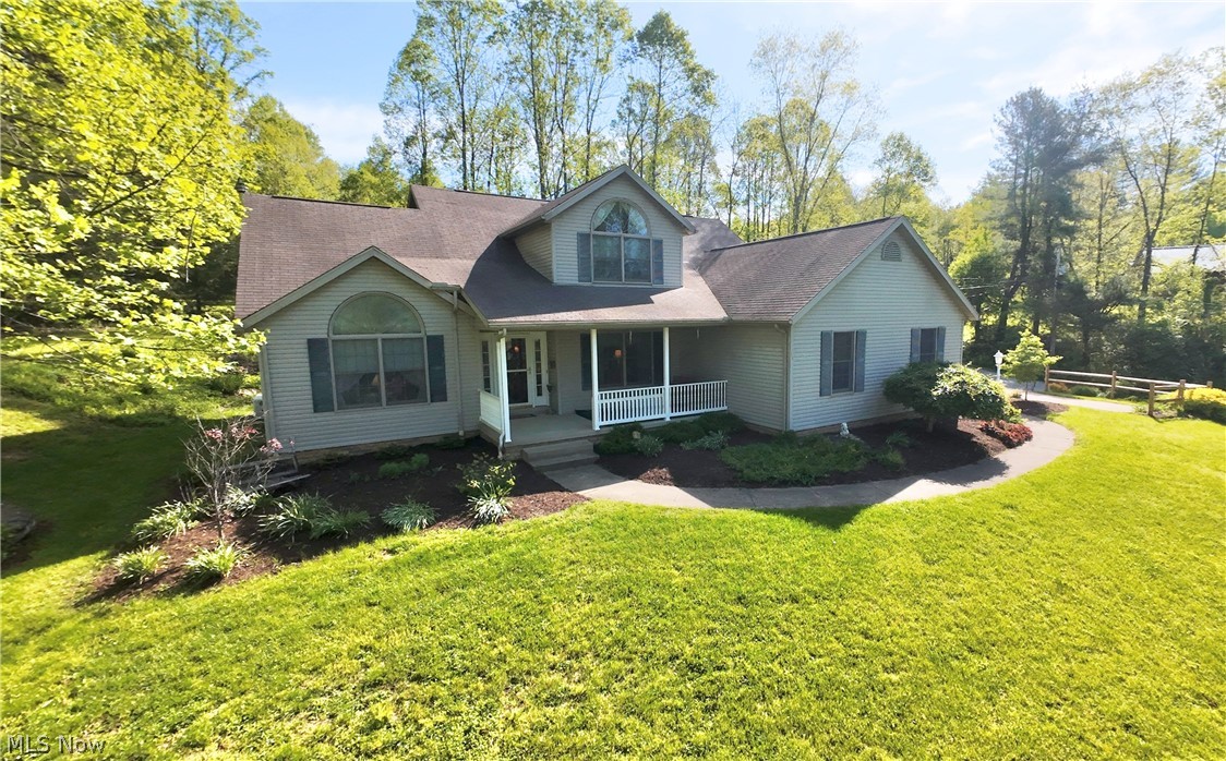 Tucked within a gated lake community just off Buckhorn Drive, this immaculately maintained home offers stunning lake views, quality craftsmanship, and exceptional amenities on an over one-acre lot. Step inside to find a custom kitchen featuring beautiful Schrock cabinetry with integrated lighting, Anderson windows, vaulted ceilings, and thoughtfully designed living spaces throughout. The main floor offers the convenience of a bedroom, full bath, half bath, and laundry, while the upper level provides 2 additional bedrooms and bonus loft area, and a full bath.

The spacious heated 2.5-car garage, large basement recreation area with bar, and new back deck with lighting create the perfect setting for entertaining and everyday living. A shed and pool table will convey with the property, adding even more value and enjoyment. Residents of this sought-after community enjoy access to lakes, ponds, beaches, tennis and pickleball courts, basketball courts, playgrounds, and common picnic areas. This is a rare opportunity to own a beautifully cared-for lakeview property that combines privacy, comfort, and resort-style amenities.