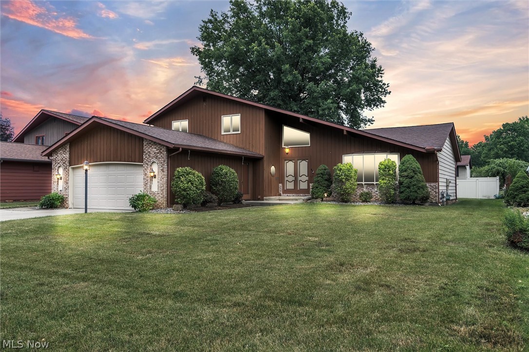 This house is located in the most sought after neighborhood off of Big Creek Pkwy in Middleburg Heights. It is on a quiet dead-end street which makes it ideal for children to bike and play. Running and biking trail to metro parks is only steps away! This home is newly remodeled with quality hardwood floors, stainless-steel appliances and much more. A grand foyer greets you with tons of natural light, vaulted ceilings, hardwood floors, and a curved staircase. The living room features an arched doorway, vaulted ceilings and bay window. The kitchen has an extensive amount of cabinets and offers granite countertops. The kitchen overlooks your immense family room with the arched openings and tons of natural light gleaming in from windows overlooking your backyard! The sizable family room features a beautiful brick, gas fireplace and recessed lighting. A bedroom and updated full bath with tiled shower are located on the first floor along with the laundry room. The second floor features a hug