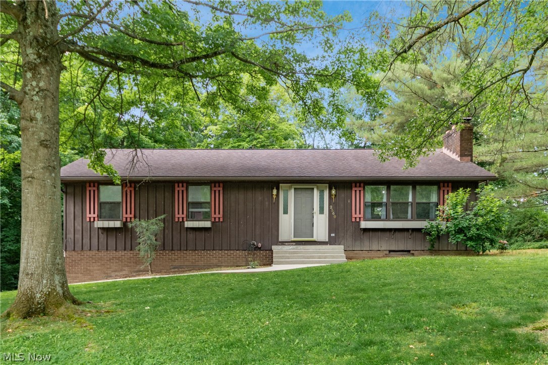 Discover the perfect blend of comfort, privacy, and natural beauty in this charming ranch home tucked inside the highly desirable Kenlo Woods Subdivision. Set on 1.10 acres of peaceful, wooded scenery, this 3-bedroom, 3-bath retreat offers the kind of tranquility that’s hard to find—and even harder to leave.

Step inside and feel instantly at home. The spacious living room welcomes you with warm natural light and a classic wood-burning fireplace, creating the ideal spot for cozy evenings. The dining area flows into an updated kitchen featuring sleek stainless-steel appliances, making everyday living and entertaining effortless. The primary bedroom offers a private bath, while two additional generously sized bedrooms and a full hall bath provide comfort for family or guests.

The finished lower level adds even more room to relax and unwind, offering a large family room perfect for movie nights, gatherings, or game days. A third full bath and a large laundry room complete this versatile space.

Step outside to your own private oasis. The back deck overlooks a serene, wooded backdrop—perfect for morning coffee, evening dinners, or simply soaking in the peaceful surroundings.

Located in the sought-after Tri-Valley School District and just 15 minutes from shopping and conveniences, this home delivers the best of both worlds: quiet country living with easy access to everything you need.

A rare opportunity in Kenlo Woods—warm, inviting, and ready to welcome you home.
