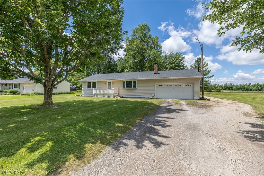 On a quiet street within the highly sought-after Keystone Local School District, Situated on .86 acres, this 1,322-square-foot home features 3 bedrooms and 1.5 half baths, providing easy, one-floor living.

Inside, you'll appreciate the many updates throughout, including the kitchen, appliances, bathrooms, flooring, roof (2026), and hot water tank. The thoughtfully designed kitchen offers a walk-in pantry and a stunning picture window overlooking the backyard, filling the space with natural light and peaceful views.

Just off the attached 1.5-car garage, a bright sunroom provides the perfect place to enjoy your morning coffee or unwind at the end of the day. Outside, relax on the backyard porch swing and take in the beauty and privacy of the spacious lot.

What truly sets this property apart is the impressive 24' x 32' outbuilding. Complete with a wood-burning fireplace and a bar that will remain with the property, this versatile space is ideal for entertaining, hobbies, projects, or creating the ultimate year-round retreat. Whether hosting friends, working on your favorite pastime, or simply enjoying cozy winter evenings by the fire, this exceptional space offers endless possibilities.

With nearly an acre of land, extensive updates, and a one-of-a-kind heated outbuilding, this property offers a rare opportunity to enjoy country-style living with the convenience of modern amenities. Schedule your private showing today!