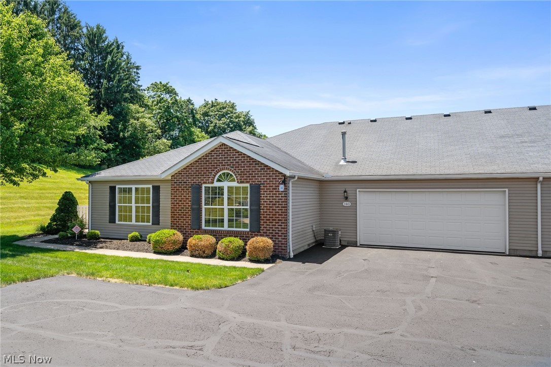 Enjoy easy, maintenance-free living in the desirable Woodbury Glen Condominium community within the Lake Local School District. This well-maintained ranch condo offers 1,114 sq. ft., 2 bedrooms, 2 full baths, and an oversized 2-car attached garage. Since 2023, the owner has completed numerous updates including new flooring throughout, professional interior painting, new garbage disposal, new garage door opener, new storm door, new smoke alarms, and new blinds with a transferable 5-year warranty. The kitchen features a full suite of appliances, most of which have never been used. The neutral décor, white trim, abundant natural light, and vaulted ceiling create a bright, open atmosphere. The thoughtfully designed floor plan offers convenient one-floor living. The spacious 16' x 14' primary suite easily accommodates a king-size bedroom set and provides direct access to a full bath. A second bedroom and full bath offer flexibility for guests, hobbies, or a home office. Both bathrooms feature updated comfort-height commodes. The oversized garage provides excellent storage and houses the furnace, hot water heater, and electrical panel. The HVAC system has been professionally inspected and maintained throughout ownership. The monthly association fee includes association insurance, exterior building maintenance, landscaping, snow removal, water, professional management, and reserve funds. Conveniently located near Hartville and Canton areas, you'll enjoy easy access to shopping, dining, grocery stores, local businesses, and the charm of Amish Country. Move-in ready and beautifully updated, this condo offers comfort, convenience, privacy, and low-maintenance living.