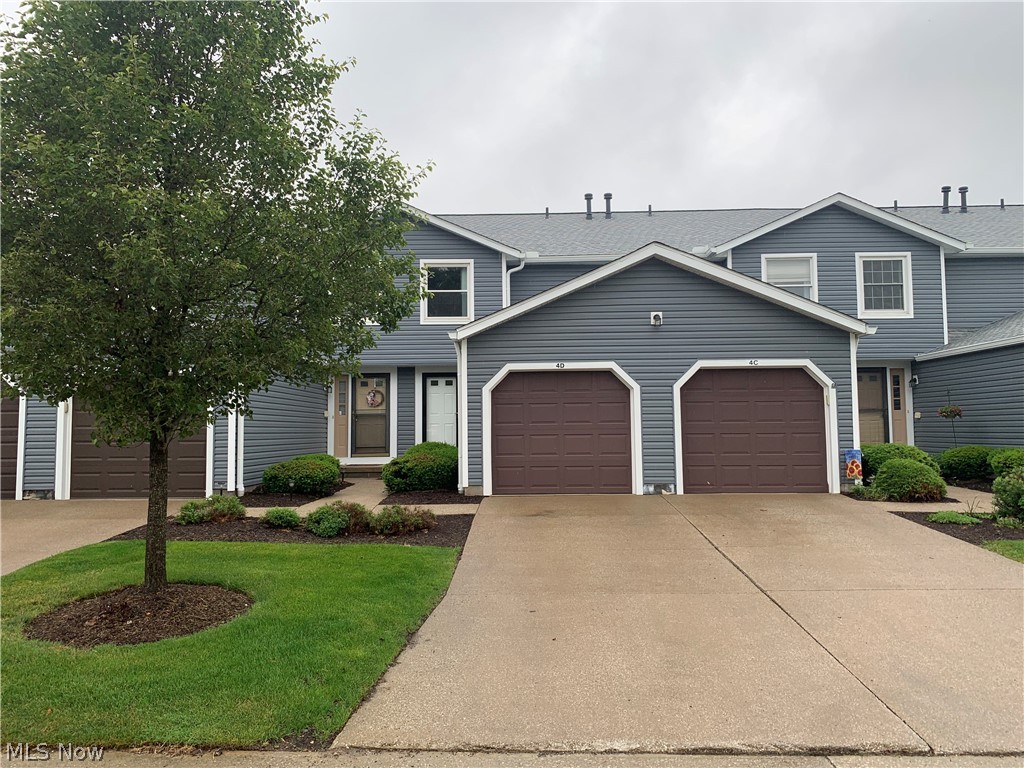 Welcome to this low-maintenance townhouse within minutes of restaurants and shopping! Recent updates include re-faced kitchen cabinets and hardware (2021), new deck boards (2021), bathroom vanities (2020 and 2017), new roof, siding, and gutters (2020), and some updated light fixtures. The partially finished basement offers a spacious rec room, a laundry room, storage space, and a workshop area. <br>All appliances are included and a one-year home warranty is provided for your peace of mind!
