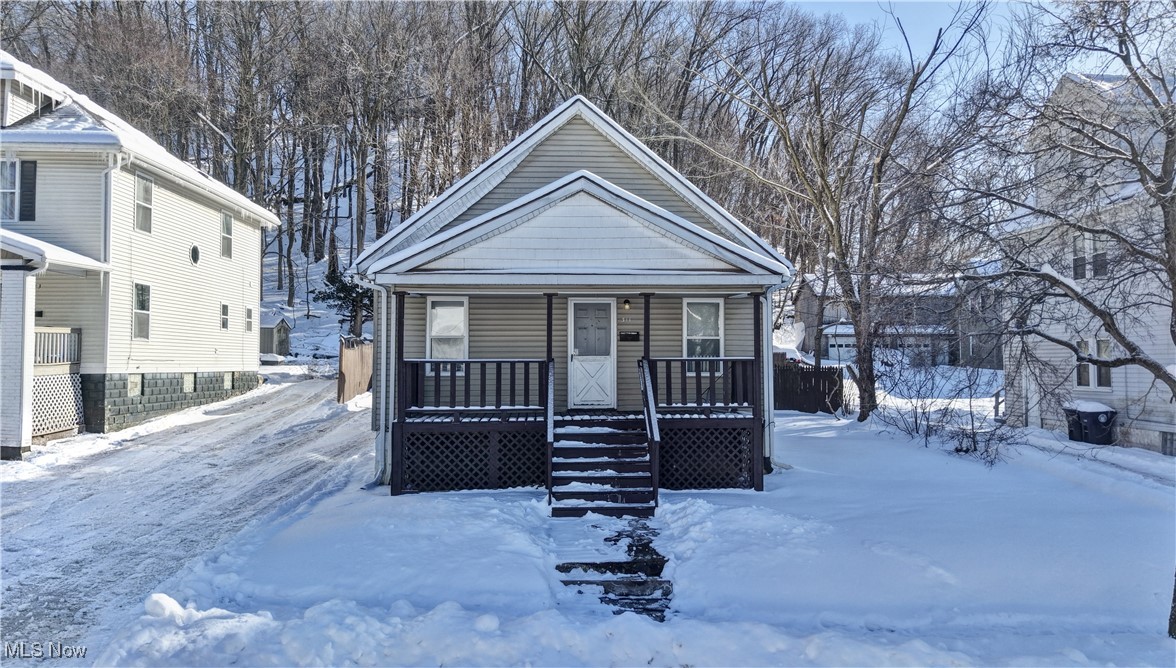 Welcome to this solid Akron home offering comfort, convenience, and opportunity. This property features a functional layout with spacious living areas and plenty of natural light throughout. The home sits on a quiet residential street with easy access to downtown Akron, major highways, shopping, dining, and local schools.  There is a full bar in the living room. Full basement. Large backyard. Furnace (2025), HWT (2024). Whether you’re an owner-occupant looking to personalize your next home or an investor seeking a value-add opportunity, this property offers strong potential. With a manageable yard and classic charm, this home is ready for its next chapter. Schedule you're showing today and explore the possibilities.