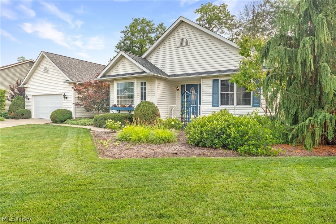 Beautifully maintained ranch offering over 2,000 sq. ft. above grade plus an additional full finished lower-level living space on a picturesque lot in Louisville. The open-concept kitchen features upgraded countertops, stainless appliances and overlooks the spacious great room with a cozy gas fireplace. Enjoy year-round views from the sunroom overlooking a beautifully landscaped backyard filled with specialty horticulture and mature plantings.

The desirable split-bedroom floor plan offers a private primary suite with a large walk-in closet and en-suite bath featuring a soaking tub. Two additional spacious bedrooms and a full bath complete the main level. Convenient first-floor laundry includes washer, dryer, utility sink, and cabinetry. A versatile flex room is perfect for a home office, dining room, or playroom.

The finished lower level expands your living space with a large recreation room that includes a dry bar, dining area, family and game room, additional fireplace, full bath, and abundant storage. Recent updates include a new roof and HVAC. Completing this exceptional home is a 2-car attached garage. Move-in ready with quality, comfort, and pride of ownership throughout!