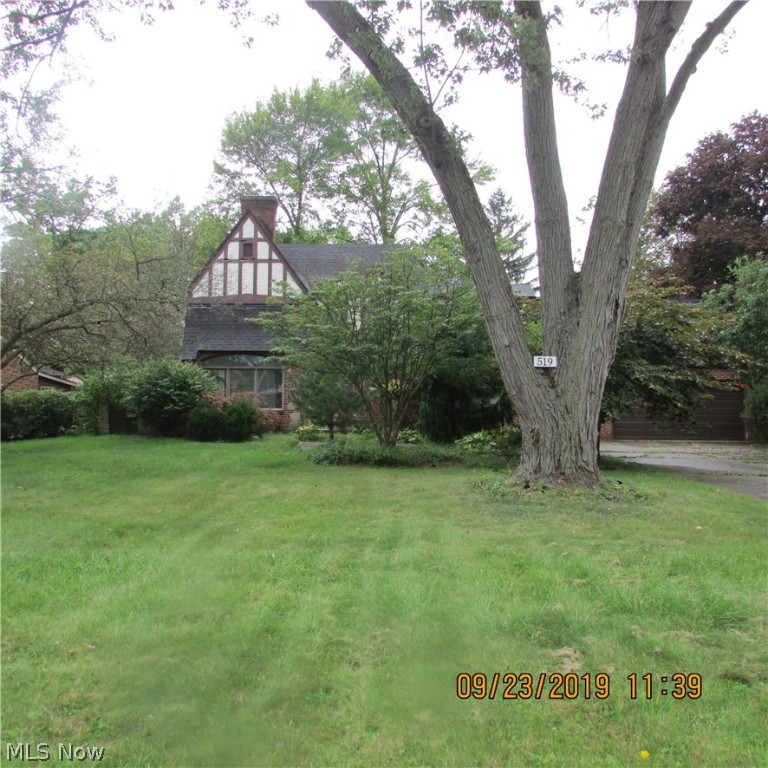 Large 1.5 story home located in the Howland/Warren City School District.  This home features a double front entry, 4 bedrooms 2 1/2 baths with a unique floor plan.  The master suite features wall to wall shelving, build in drawers and single vanity. Master bath with whirl pool tub. 1st floor laundry with back deck access.  Large eat in kitchen and breakfast bar,island, stainless plumbing, ceramic floors and plenty of counter space. Living room with double fireplace, dual separate staircase, zoned heating and air.