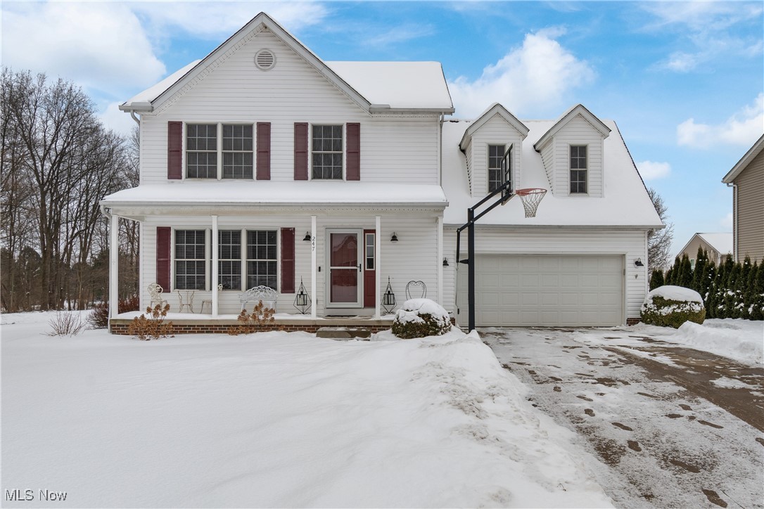 Perfectly positioned within walking distance to Bird Park, this charming 4-bedroom, 2.5-bath Colonial in Wadsworth’s desirable Parkside neighborhood offers warmth, space, and room to truly settle in. Built in 2006, the home features a welcoming layout with a spacious living room highlighted by a cozy gas fireplace and an easy flow into the dining area and kitchen. A true standout is the massive screened-in porch—perfect for relaxing or hosting—overlooking the partially fenced backyard and convenient storage shed. Upstairs you’ll find four generously sized bedrooms, including a primary suite with vaulted ceilings, double vanity, and walk-in closet, along with the added convenience of second-floor laundry. The partially finished basement provides valuable additional living space with a large recreation area, ideal for a home gym, media room, or play space, plus ample storage. Additional highlights include central air, a two-car attached garage, landscaped yard, sidewalks, and close proximity to schools and neighborhood amenities.