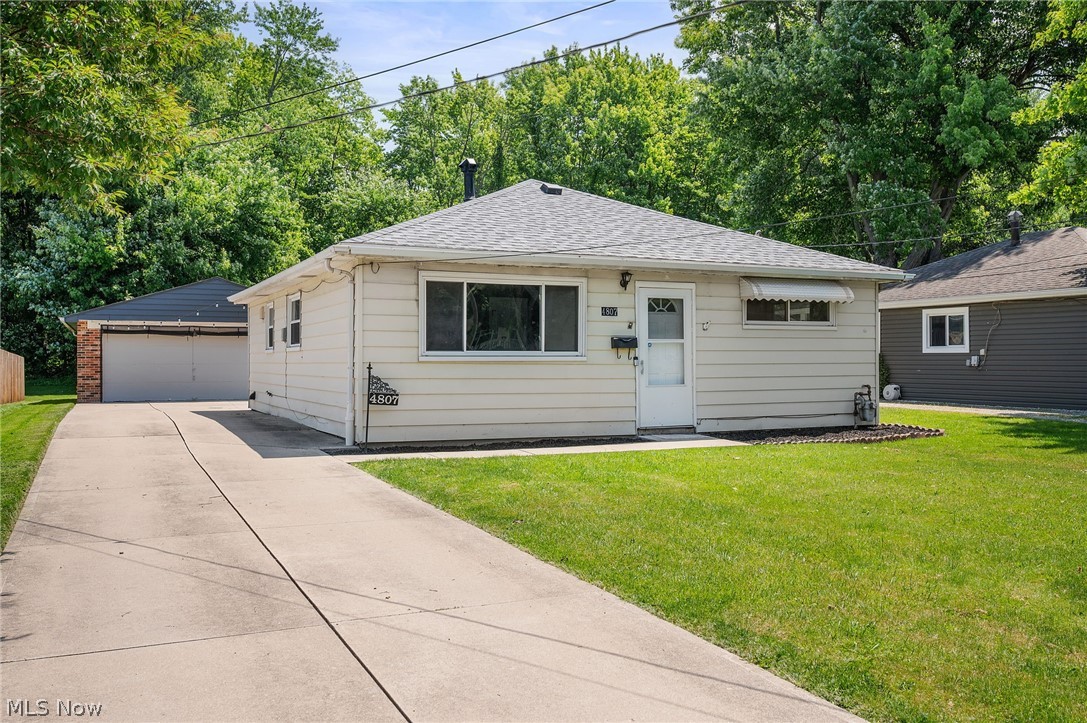 Move-in ready Ranch home located on a quiet street in Mentor’s Willow Bluff Farm neighborhood, backing to Morton Park with wooded views and no neighbors behind. Just steps from Morton Community Pool & Spraypark and conveniently located near OH-44, OH-283, Mentor Headlands Beach, shopping, dining, and everyday amenities. This 3-bedroom, 1-bath home offers comfortable single-floor living with updated carpeting, fresh paint, and an inviting layout. A spacious eat-in kitchen features abundant cabinet and counter space, all appliances included, laundry hookups, and direct access to the backyard. Open to the living room, the layout creates a functional gathering space highlighted by a large picture window that fills the room with natural light. Three bedrooms and a full bath complete the interior. An oversized detached 2-car garage provides ample room for vehicles, storage, hobbies, or workshop space. RECENT UPDATES include: Replaced roof (2023), refrigerator (2023), stove (2022), carpet throughout (2023), added insulation in attic (2023), mulch in yard (2026), and freshly painted throughout (2026). INCLUDED are ALL kitchen appliances and a 1-year home warranty. A great opportunity for those seeking a move-in ready home in a convenient Mentor location close to parks, recreation, and Lake Erie attractions.