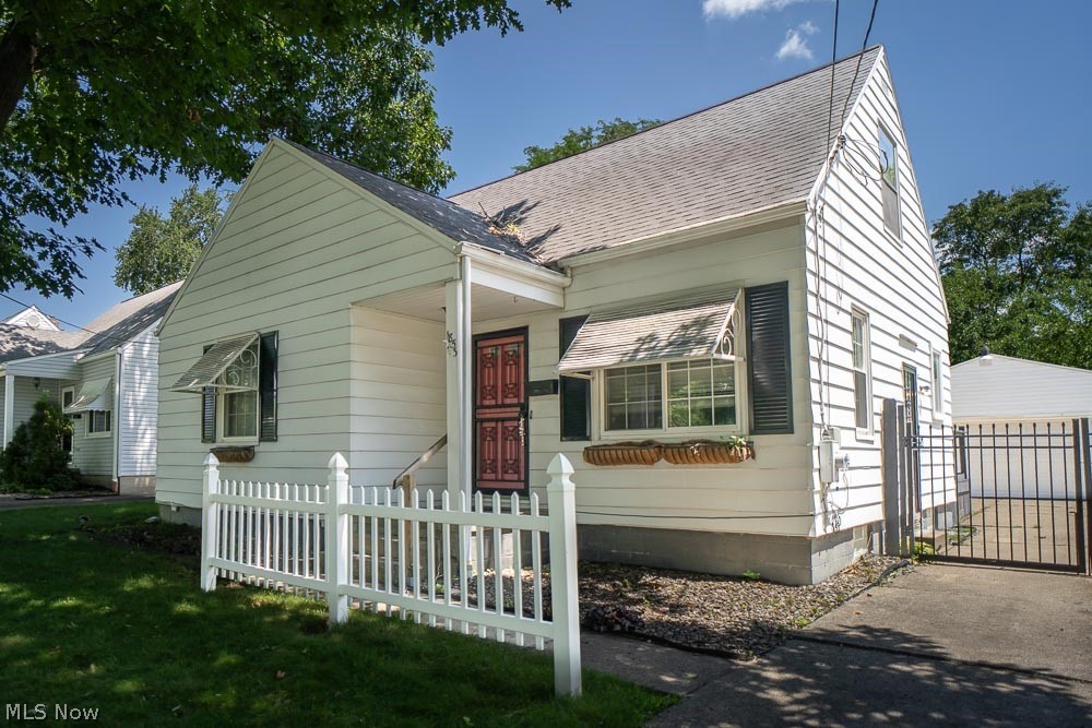 Welcome to this beautifully updated and exceptionally maintained Cape Cod in the heart of Firestone Park! This move-in-ready home offers 4 bedrooms, 2 baths, and an abundance of flexible living space designed to fit today's lifestyle. The main level features three spacious bedrooms which have beautiful hardwood under the carpet, a beautifully updated full bath with a stylish illuminated anti-fog mirror, and luxury vinyl plank flooring. Gorgeous original hardwood floors throughout the inviting living area filled with natural light. The updated eat-in kitchen is equipped with stainless steel appliances, a smart stove, and sliding glass doors that open to a stunning deck overlooking the fully fenced backyard with a firepit; creating the perfect setting for entertaining, family gatherings, or peaceful evenings outdoors. Upstairs, you'll find two finished rooms offering endless possibilities for a fourth and fifth bedrooms, home office, sitting room, playroom, or bonus space. The lower level provides even more living space with a family room, workshop, canning/storage room, unfinished bathroom with shower, and a brand-new hot water tank. Additional upgrades include ceiling fans with remote controls throughout, an oversized 2½-car garage, a storage shed, and a wood privacy fence with a convenient rear gate leading directly to the garage. For added peace of mind, this home also includes an America's Preferred Home Warranty. Combining timeless charm with thoughtful modern updates, versatile living spaces, and exceptional value, this is a rare opportunity to own a truly turnkey home in one of Firestone Park's most desirable neighborhoods. Don't miss your chance to make this beautiful home yours! Schedule your private showing today!