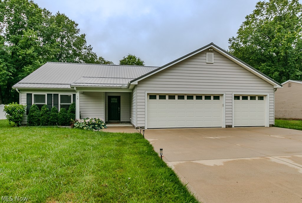 Welcome to this beautifully maintained 2017 ranch, where modern design, energy efficiency, and comfortable one-floor living come together seamlessly. Offering 3 spacious bedrooms and 2 full baths, this move-in-ready home features an inviting open-concept floor plan that's perfect for both everyday living and entertaining.

The stunning kitchen serves as the heart of the home, showcasing rich dark wood cabinetry, stainless steel appliances, a center island, and a spacious dining area. The kitchen flows effortlessly into the bright and welcoming living room, creating an ideal gathering space for family and friends.

Designed with privacy in mind, the owner's suite is thoughtfully separated from the additional bedrooms and offers a peaceful retreat at the end of the day. Step outside through the sliding glass doors to a covered porch complete with a ceiling fan, providing the perfect spot to enjoy your morning coffee or unwind on warm summer evenings. The backyard features a cozy fire pit area, making it ideal for outdoor entertaining and creating lasting memories.

A three-car garage provides abundant storage and workspace, while additional upgrades—including a durable metal roof, high-efficiency furnace, and tankless water heater—offer peace of mind and low-maintenance living for years to come.

Combining modern amenities, thoughtful design, and exceptional outdoor space, this beautiful home is ready to welcome its next owner. Don't miss your opportunity to make it yours!