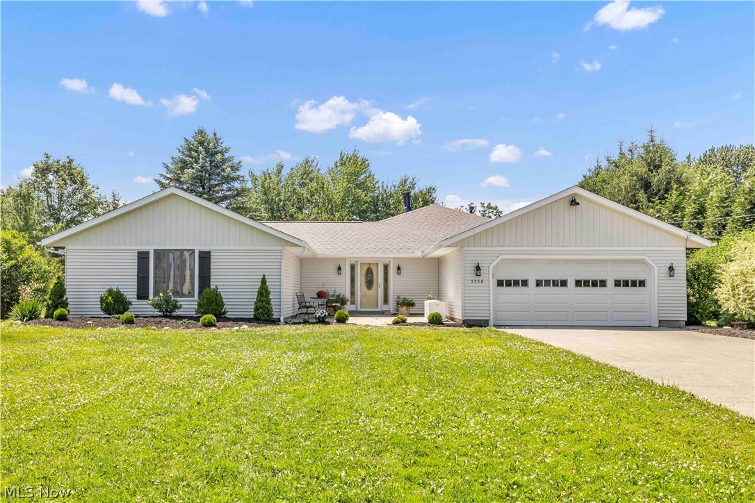 Exceptional custom ranch situated on 6 scenic acres in the heart of North Ridgeville! This spacious 4-bedroom, 2.5-bath home offers over 2,800 square feet of living space designed for both comfortable everyday living and entertaining. The inviting floor plan features a light-filled living room with a gas fireplace, formal dining room with an extra room for storage, and a large eat-in kitchen with abundant cabinetry, expansive counter space, and stainless-steel appliances and a large family room with a wood burning fireplace. The kitchen opens seamlessly to an impressive family room highlighted by a second fireplace, a wet bar and beautiful windows overlooking the picturesque back yard. Skylights throughout the home enhance the bright and airy atmosphere.

Additional highlights include a private office off the kitchen (could be used as office/flex space/guest room), generous laundry/mud room, and an expansive deck perfect for enjoying the peaceful surroundings. A 2-car attached garage provides ample storage, while the 2 outbuildings offer endless possibilities for a workshop, hobby space, home business, barn, or mechanic's dream retreat. Conveniently located just minutes from I-90, shopping, dining, and local amenities, this unique property combines privacy, acreage, and accessibility in one remarkable package.

Notable updates:
New Roof and front siding
Newer Stainless-Steel Appliances
New blinds (1 year old)
Granite countertops
1/2 bath recently remodeled
LVP installed within past 2 years
AC/Furnace units are serviced every 6 months

Highlights:
4 Bedrooms | 2.5 Bathrooms
Approximately 2,820 SF
6 Acres
Two Fireplaces (one gas, one wood burning)
Private Office
Outbuildings/Workshop
Expansive Deck
Convenient Access to I-90, Shopping & Dining