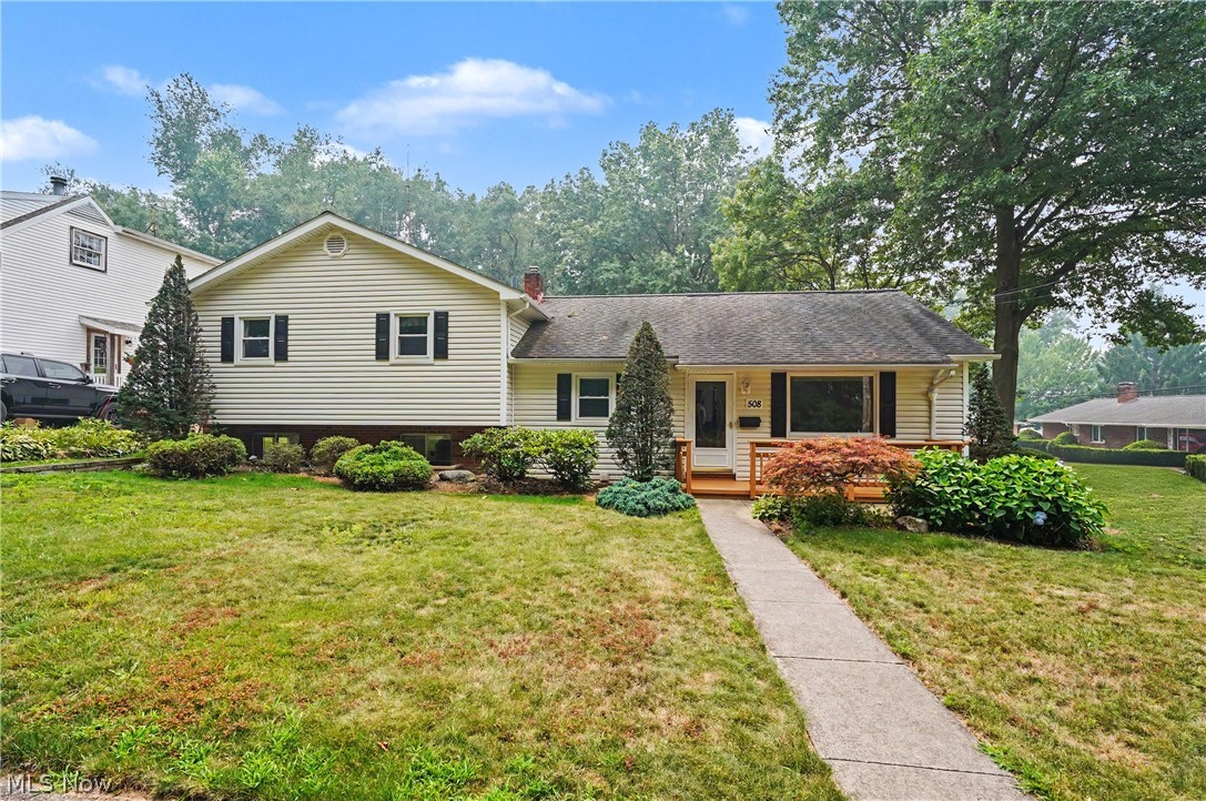 This is not your typical Cuyahoga Falls home! This split level home sits on 2 lots, features a 3 car garage, and over 2,000 sqft of living space! The home has a spacious deck with a slider to the kitchen off the driveway at the back of the house, providing plenty of room for weekend parties and cook-outs. Space is never an issue in this home as it feature 4 bedrooms PLUS an office, with one of the bedrooms on the main level! In addition to the front living room, the lower level has a massive family room with a wood burning fireplace and entire brick wall, and yet there is another separate 827sqft of unfinished basement area! When I first visited this home, I was caught off guard with the size, and I believe it will please you as well. Sure, there are some updates that you may want to do, but this is the perfect example of great bones! Some of the spaces have been updated over the years already, such as a new walk-in shower roughly 3 years ago, new LVP flooring in the bathroom at that same time, and new LVP flooring in the kitchen around 3 years ago as well. The windows and siding are not original as they were replaced roughly 15 years ago and the AC is only 10 years young. If you are looking for a spacious home, plenty of yard and garage space, this is the home you must put on your list to visit.