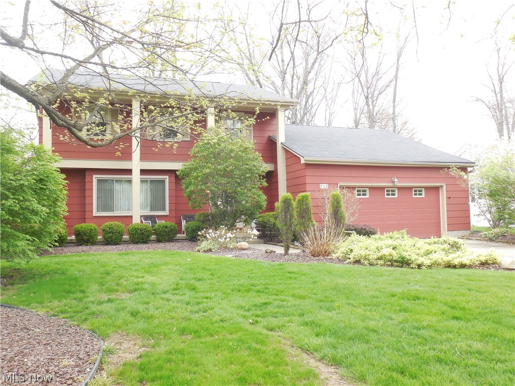 Pride of ownership shows in this 2 story 4 bedroom 4 bath home. Huge kitchen with custom oak cabinets by Kraft maid, newer laminate floors, and appliances to stay. Family room with wood burning fireplace, window seat, 2 closets, and panel walls. Formal living and dining room with newer windows. 1st floor laundry room with built-in iron board. Beautiful sun room with 2 skylights and wood ceiling. Master bedroom with walk-in closet plus double closet. The master bath has newer ceramic tile floors with 2 sink areas and shower. Another full bath 2nd level with ceramic tile floors double sink tub/shower combo. Plus 3 more bedrooms. Finished basement with rec room and office with new carpet, plus large storage area.Newer forced air Heil furnace and a/c. 200 amp electric 40 gallon hot water and full bath with ceramic tile floors shower only. 2 1/2 car garage with new garage door, door opener, pull down stairs for tons of storage. Nice front Porch area and large side deck which wraps around ba