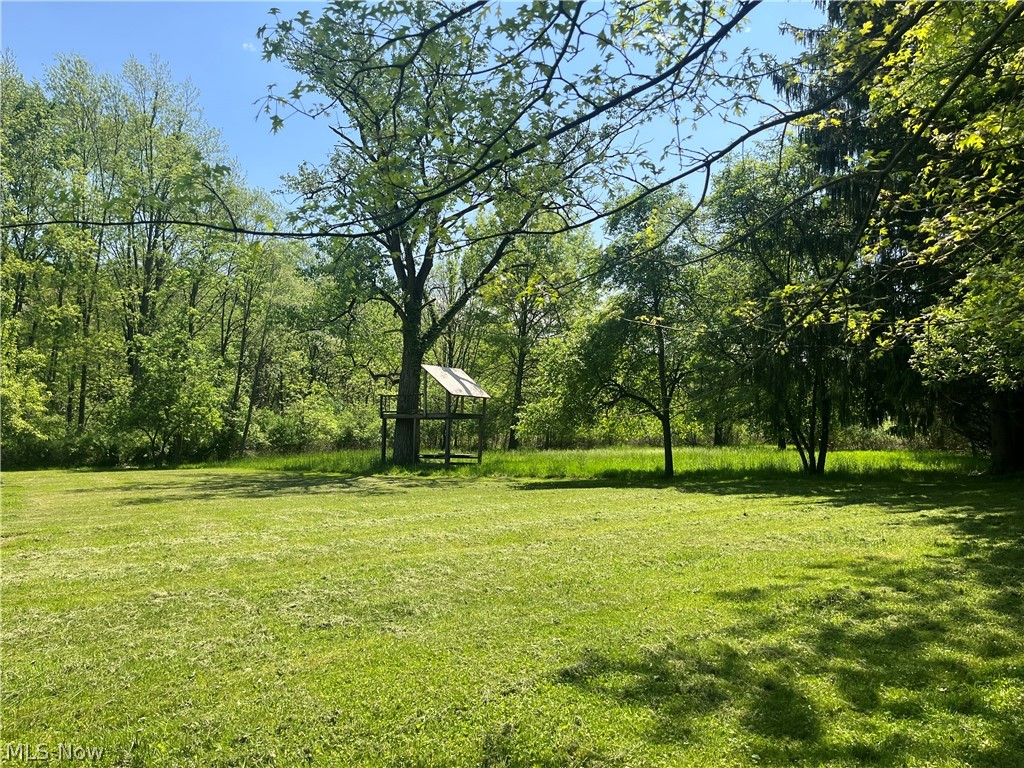 Welcome to a rare opportunity to own over 7 beautifully diverse acres, perfectly situated on a corner lot in Jackson Township. Whether you're looking to build your dream home, create a private retreat, or invest in future potential, this stunning property offers the ideal canvas. With a harmonious blend of mature woods and open space, you’ll enjoy both privacy and flexibility. Picture your home nestled among the trees with room to spare for a garden, barn, or workshop. The wooded area offers shade and seclusion, while the open land provides sunlit space for recreation, pasture, or expansive views. Located in the corner of the township, this lot offers convenient access while maintaining a sense of peaceful seclusion. It’s a rare combination of natural beauty and strategic positioning—ready for your vision to take root