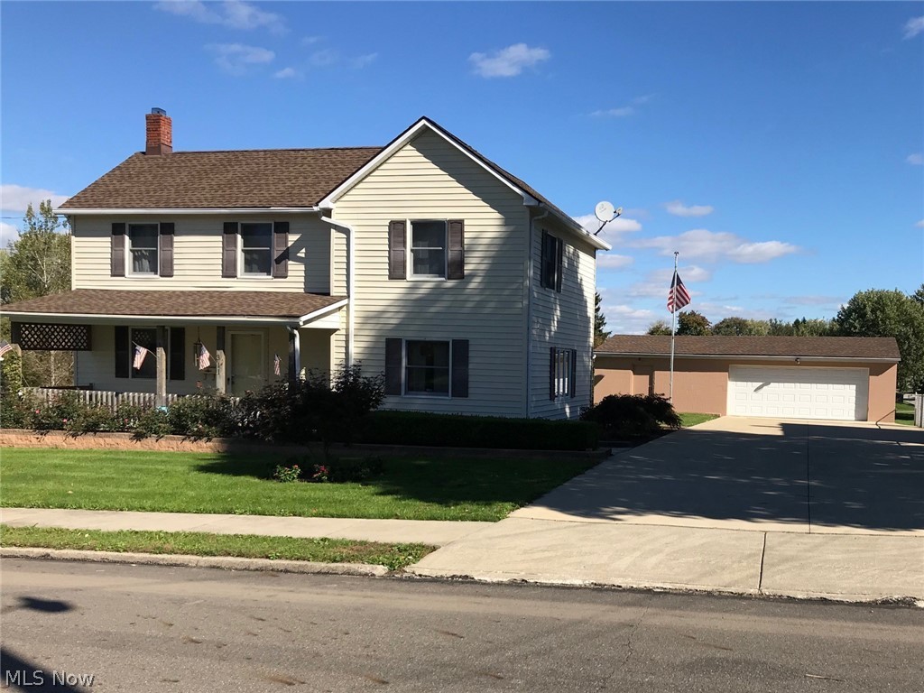 Take time to see this well maintained 3 bedroom 2-Story with 1 1/2 baths and sits on deep, nicely landscaped over half acre city lot. The Eat-in-Kitchen with appliances opens to the Family Room for good entertaining plus spacious Living Room.  The extra wide concrete driveway leads to a 2-car garage with a large work area.  Attached to the back of garage is an additional structure for more storage. Call for an appointment to see.