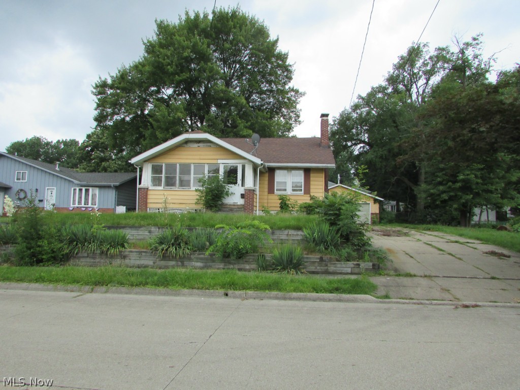 2 Bedroom Bungalow that needs TLC.  large lot with 2 car garage.  large kitchen.