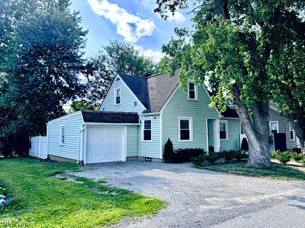 Welcome Home! Experience village living at its finest in this completely renovated 3-bed, 1-bath home in the heart of Lodi. Situated on a quiet street, you'll love the prime location just one block from Lodi Town Square, local events, and amenities. Inside, a bright layout features a spacious living room with LVT flooring and a cozy "fire-and-ice" fireplace heater with remote, leading to a dining room with elegant arched doorways and a custom built-in Hall Tree. The stunning, fully remodeled eat-in kitchen (2022) boasts solid surface countertops, stainless farmhouse apron workstation sink, tile backsplash, premium LVT flooring & appliances (dishwasher, stove, microwave, & disposal). The main level offers a beautifully updated full bath ('22) with a new vanity, Kohler fixtures, and shower surround, plus a first-floor Primary bedroom with carpet over original hardwood. Upstairs holds 2 nice-sized bedrooms, freshly painted! The lower level expands your space with a brand-new rec room featuring premium InSoFast wall insulation panels, updated plumbing to waste stack, vented glass block windows, spacious laundry room & potential for a 4th bedroom! The exterior is a backyard dream. The fully fenced yard showcases a massive paved patio, hard-top gazebo, new rear privacy fence ('26), fresh landscaping, storage shed/chicken coop, new front walkway & chip/seal drive. The attached garage features upgraded electric, outlets, new lighting, new door tracks, springs, automatic opener, and new entry steps. Major mechanical peace of mind is guaranteed with a newer roof/gutters ('18), brand-new garage roof/chimney flashing ('26), premium Trane furnace ('18), new central air unit with all-new runs ('22), new hot water tank ('22), new electric panel ('22). Walk to village parks, CLE Clinic, splash pad, library. Quick access to highways, grocery store & much more! Highlight sheet & dates of renovations available. Owner is a Licensed Agent in Ohio. Listing Agent is related to the Seller.
