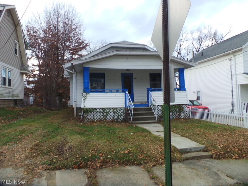 Two bedroom ranch home with lots of potential.  Hardwood floors, natural woodwork.  Newer kitchen cabinets, updated bath.  Lots of possibilities!  Property sold AS IS.