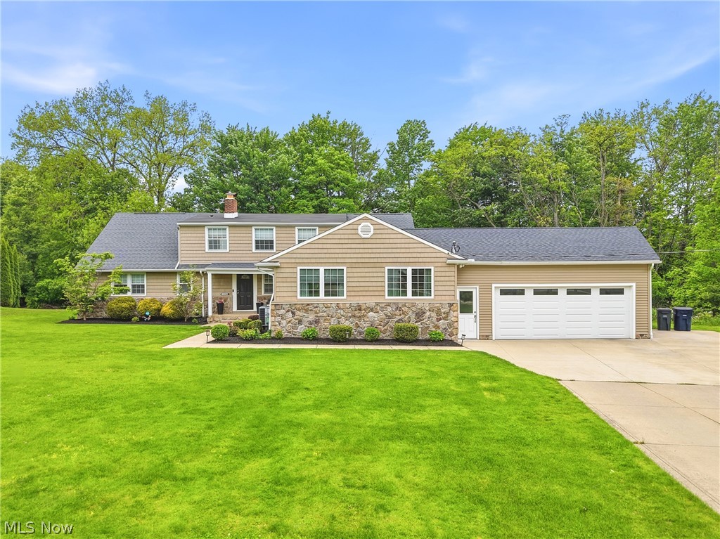 Beautifully updated and truly turnkey, this exceptional 6-bedroom, 4.5-bath home sits on a spacious park like wooded lot at the end of a quiet cul-de-sac offering a serene setting. Designed for flexibility and comfort, the main floor features a private in-law suite with its own entrance, full kitchen, bedroom, and full bath- perfect for multi-generational living.

Also on the main level are the primary suite, an additional private suite, and the laundry area. The large, updated kitchen offers abundant counter space and cabinetry, opening to a stunning sunroom dining area filled with natural light.

An oversized garage accommodates 3+ vehicles with tandem parking and provides excellent storage.

A rare combination of space, updates, and versatility - do not miss this unique opportunity!