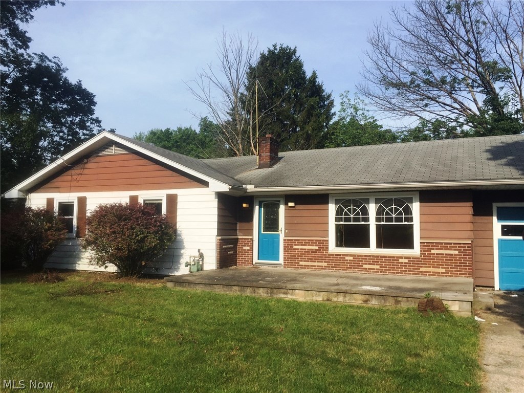 Unique opportunity to own a cool 3 bedroom ranch on a huge lot in Rootstown Schools!  1.42 acre lot overlooks a stocked pond, 1/6 ownership in pond will also convey!  Add your personal touches to make this a truly remarkable home and setting.  2 car attached garage, hardwood flooring under all bedroom carpeting, nice floor plan features open kitchen/dining/living room, sliders to back yard.  Plans for additional bath/living space were started and are plumbed outside in back.