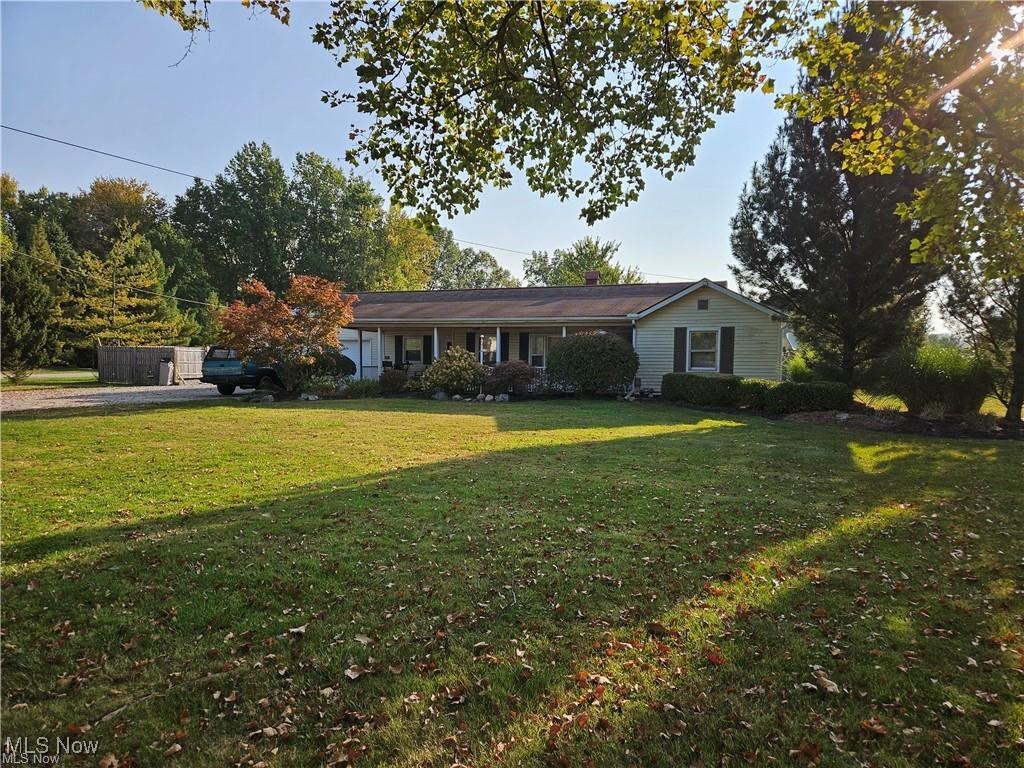 Spacious 3-bedroom Ranch situated on a beautiful 2-acre lot with 150’ of frontage, with two large outbuildings. The kitchen has oak cabinets that flow through to the dining room, and a spacious living room with plenty of natural light. The 55x40 building is heated, insulated, has concrete flooring, and offers 100 AMP/220 service. The larger building is 88x42 and features three sliding doors