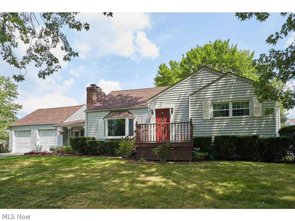 Welcome home to this updated and well-kept Cape Cod located in the heart of Fairlawn. Situated on a double lot, this spacious home has so much to offer. Through the front door, you will be greeted by a large living space, a cozy fireplace, and a large bay window (2016) which gives this room plenty of natural light. The new flooring throughout the main level is striking (2018). Completely remodeled main floor bathroom (2017) with beautiful tile and glass shower door. Master bedroom is generously sized with dual closets. Partially finished basement and waterproofed (2015) You will appreciate the convenient breezeway which also offers new flooring (2018) and is connected to the two-car garage with attic storage space. The back yard of this home you will fall in love with, especially if you enjoy entertaining. Fully fenced-in with lovely deck and new landscaping complete this home's exterior.