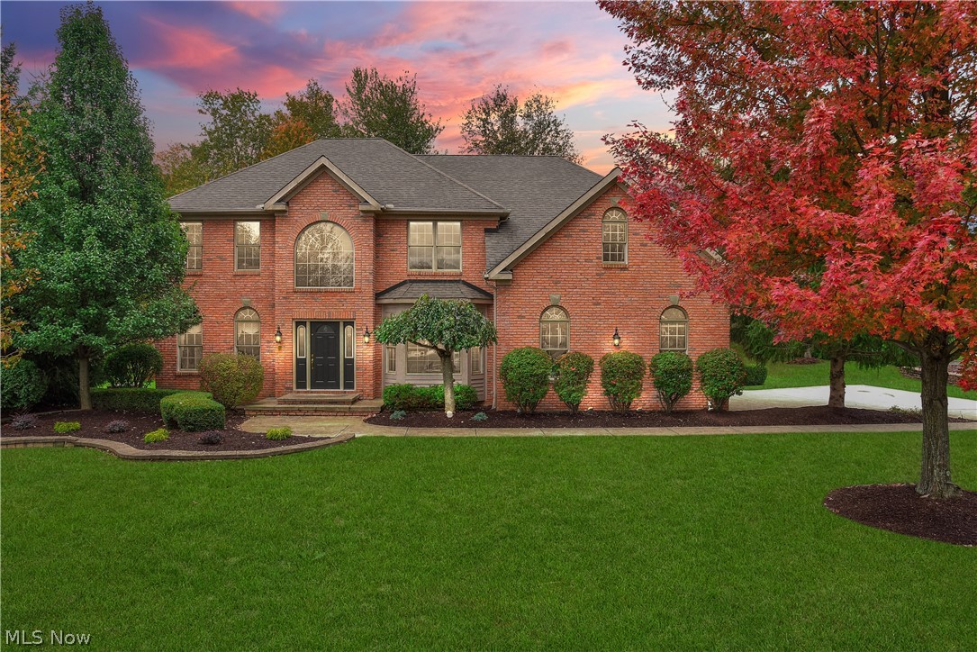 Stunning Custom Built Brick Front Colonial with extensive qualities and amenities.  Built by United Homes.  One owner home!!! TRUE PRIDE of ownership! Open floor plan.  with 2 story foyer with Wood Floors 2 stair case to 2flr.  2 Story family room with a wall custom windows & fireplace.  Spectacular large eat-in Kitchen with custom cabinets, granite countertops, newer back splash , wood floors, large island, door to stamped patio, desk area and a walk-in pantry.   Formal dining room with newer floors tray ceiling and bay a window.  Beautiful formal living room with custom windows.  1st floor office/den with french doors and a bay window. 1st Floor laundry room.  Split staircase leads you upstairs to 4 large sized bedrooms. Spectacular Master bedroom is complete with vaulted ceilings and Sitting area.  Glamour bath double vanity Jacuzzi Tub and 2 huge walk in closets.  Amazing Full finished lower level with great room, recreation room/work out area, additional bedroom with full bath and