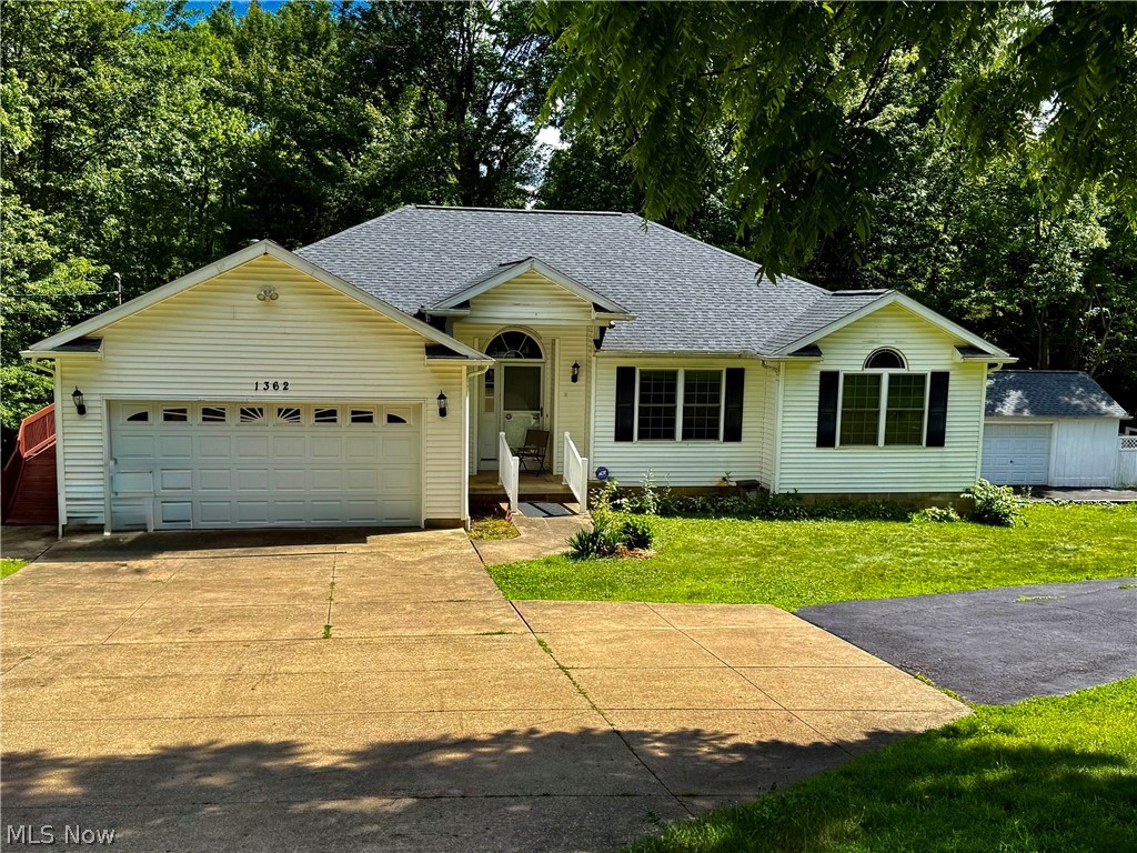 Welcome home to this spacious 3 bed, 2.5 bath ranch with walk out basement situated on a gorgeous 1.4-acre corner lot w/ access off of either street & plenty of room for parking on its extra-long driveway. Prime location close to everything Portage Lakes area has to offer. New Franklin/Coventry local school district. This is a one owner home which was custom built in 2000. Resent update include a new furnace w/heat pump & air handler (April 26), Central A/C (April 26), Water softener filtration system w/neutralizer (Jan 25), & for added peace of mind a new roof is scheduled to be installed w/transferable warranty. Home comes with a Generac generator, 2 car attached garage, 1.5 detached garage. Out back you will find a two-tier wrap around deck w/ramp each level is 30x16. Inside you will find a large eat in kitchen w/breakfast bar, dining area, & dining room. Open floor plan & vaulted ceilings. Primary bed has a walk-in closet and a full bath, 2 nice beds, laundry room with storage, large living room has vaulted ceilings, walk out unfinished basement offers so many possibilities just need your finishing touches, glass block windows & a half bath. All appliances stay. Just needs some minor cosmetic updates to make it your own all the major updates have been done. Hurry you don't want to miss this one.