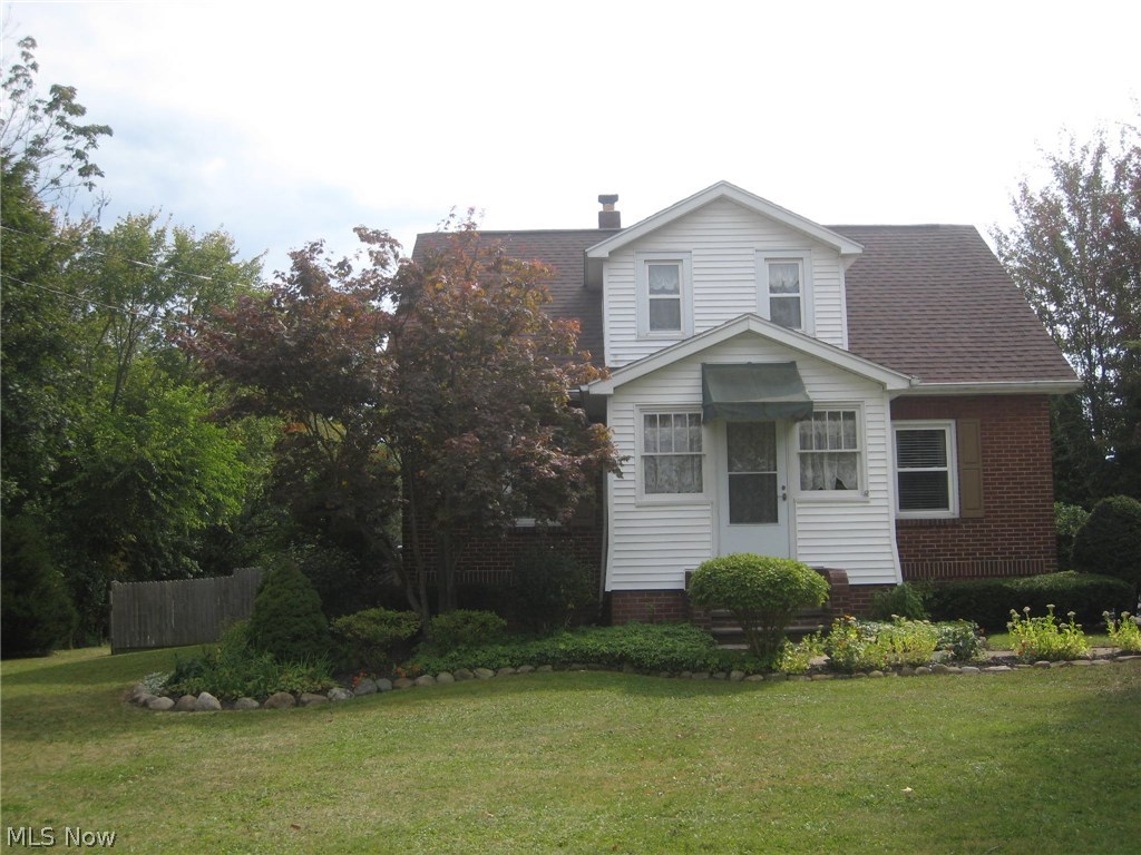 As you pull in the drive,  the True Pride of Ownership shines throughout the meticulously maintained and improved 3 BR 1.5 Bath Brick Cape Cod on 1.07 acre lot.  The living room, Dining room and hallway feature recently installed laminate flooring that accentuates the natural woodwork.  The freshly painted walls of soft gray reflect the natural light that filters throughout the house.  The Kitchen has ample cupboards and stainless steel appliances.  The full bath was remodeled recently and features updated fixtures, lighting, sink, flooring and commode.  First floor bedroom with wool Persian carpet is being used as an office.  Up stairs are 2 good size bedrooms and a small room that could be a nursery, office, playroom, or maybe a walkin closet.  Great closet space and storage throughout.  The basement has another half bath,  all painted and ready to finish.  Other updates include the septic system, roof, hot water tank, vinyl replacement windows, electric panel and electric heated fir