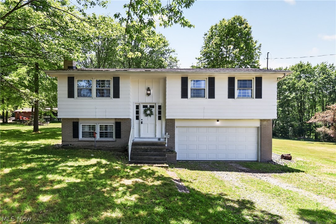 Take a look at this professionally remodeled home in Hubbard. The kitchen has been updated with all new flooring, countertops, and all new stainless steel appliances. The dining area and living room have hardwood flooring throughout. The bathroom has tile flooring and a white vanity. Fresh new carpet has been placed in all of the bedrooms. The 4th bedroom has a beautiful stone fire place and can be used as an extra living room or play area if a 4th bedroom is not needed. The attached garage is convenient for keeping your vehicle warm during winter nights and out of the weather elements. There's a shed to keep lawn equipment and extra tools. The yard is also big enough for a play area for kids or a garden. Come and make this your new home today!