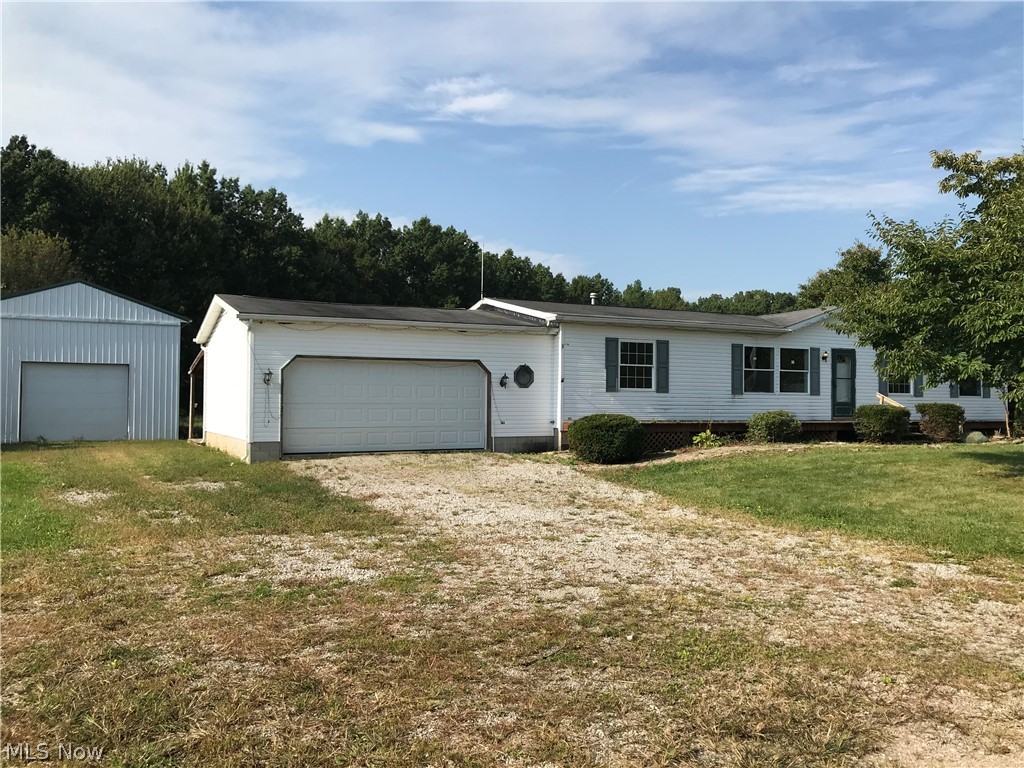 Modular Country Home in Firelands School District. 4 Bedrooms 2 Baths. Attached 2 Car Garage and 24x32 Outbuilding. Bank Owned. Sold As Is.  All Offers must be submitted by the buyer's agent using the online offer management system. Access the system via the link below. A Technology Fee will apply to the buyers agent upon consummation of a sale.