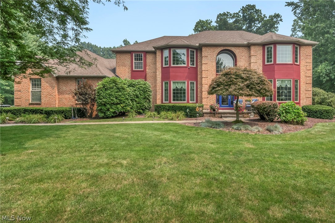 Absolutely spectacular, fully updated 4–5 bedroom, 4.5 bath smart home situated on nearly 2 acres with city utilities—offering a rare combination of privacy and convenience. This impressive property features a heated 3.5-car garage and an incredible outdoor setup including an in-ground pool, fountain, hot tub, spacious patio, and scenic wooded backyard.

Inside, the home offers a thoughtfully designed layout with 9-foot ceilings throughout the main level and new luxury wood plank flooring on the first floor, basement, and primary bedroom. The front living room showcases a tray ceiling, while the expansive great room features a dramatic floor-to-ceiling brick fireplace. The kitchen is truly a standout with a large center island, breakfast area, coffee bar, pull-out pantries, granite countertops, and stainless steel appliances. Additional main level highlights include a formal dining room with bay window and tray ceiling, sunroom, laundry room, office or optional 5th bedroom, and half bath.

Upstairs, the spacious primary suite includes a tray ceiling, walk-in closet, and a completely renovated en-suite bath featuring double European sinks, vanity area, Toto smart toilet/bidet, and a floor-to-ceiling tiled walk-in shower with jets. A second bedroom offers its own private full bath, while two additional bedrooms share a Jack and Jill bath.

The finished lower level expands the living space with a large recreation area, dining space, wet bar, family room with floor-to-ceiling stone fireplace, full bath, and ample storage.

This home combines high-end features, modern updates, and exceptional indoor-outdoor living in one remarkable property.