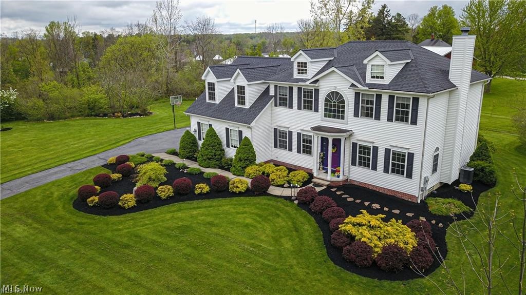 Welcome to this exceptional Colonial nestled in a highly sought-after community, offering the perfect blend of space, comfort, and effortless indoor-outdoor living. Set on over 3 picturesque, park-like acres, this 4-bedroom, 2.5-bath home is designed for both everyday living and unforgettable entertaining.
A dramatic two-story foyer welcomes you inside, flanked by a spacious living room with a cozy fireplace and a formal dining room, both featuring updated flooring. The expansive eat-in kitchen is the heart of the home, complete with a center island and oversized pantry, ideal for gathering and hosting.
French doors lead to a charming 3-season room, the perfect place to enjoy peaceful morning coffee or transition seamlessly to summer gatherings. Step out onto the custom composite deck that stretches to your impressive 30-foot round pool, fully equipped with durable all-aluminum construction, along with a newer pump and heater for worry-free enjoyment.
The beautifully landscaped grounds continue to impress, offering a private garden area and a dedicated fire pit space, perfect for relaxing evenings under the stars.
Convenience meets functionality with a first-floor laundry room and half bath. Upstairs, the spacious owner's suite features a spa-like bath with a Jacuzzi tub, updated glass shower door, double vanity, and walk-in closet. A generously sized second bedroom offers flexible use as an additional suite or bonus living space, while two more well-appointed bedrooms and a full bath complete the second level.
The partially finished lower level adds even more versatility with a recreation room, workshop, and abundant storage. A rare 3.5-car insulated garage with built-in shelving provides ample space for vehicles, hobbies, and more.
With major updates including newer appliances and well pump (since 2018), this home offers peace of mind along with exceptional value, all in a serene, scenic setting you'll love coming home to.