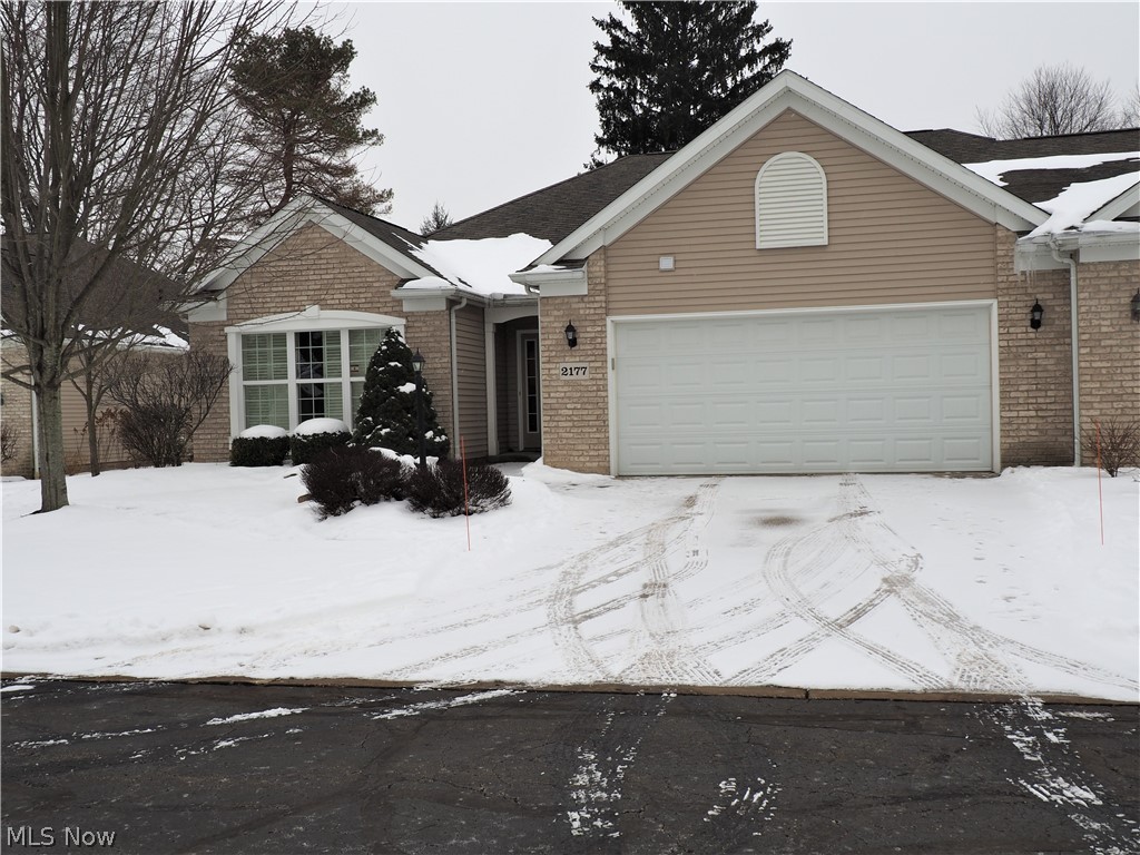 HOA  $435 QUARTERLY.  Great location in Stratford Green. Wonderful 2 bedroom, 2 bath cluster home ranch on a cul-de-sac Skylights in vaulted ceiling in great room. Large master suite with private bath with Jetted tub plus walk-in shower. Roomy walk-in closet in master.  Large foyer entry with wood floors  leads to a bonus room great  for an office or den then to the spacious eat-in kitchen with wood floors. Appliances stay.  First floor laundry, washer and dryer stay..