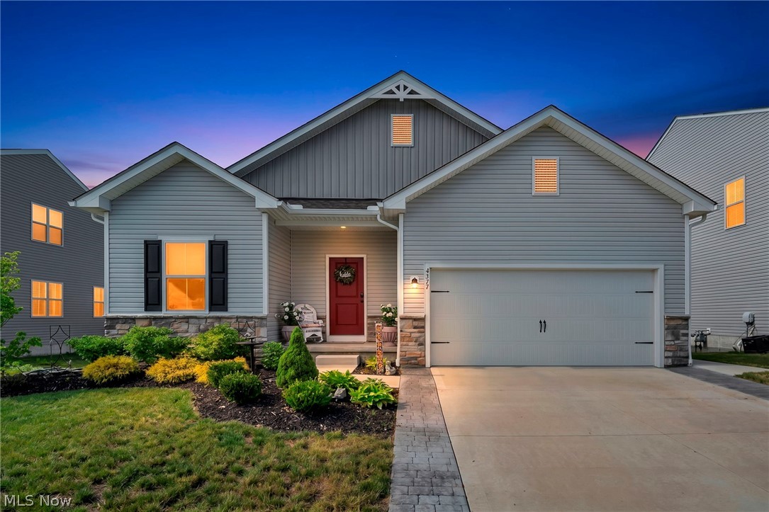 Better than new! Built in 2023 by K. Hovnanian Homes, this beautifully upgraded 3-bedroom, 3-full-bath ranch combines modern design, quality craftsmanship, and thoughtful upgrades throughout. Step inside to an open-concept floor plan filled with natural light, featuring luxury vinyl plank flooring and finishes from the sought-after Farmhouse Look Collection. The spacious kitchen flows seamlessly into the dining and living areas, creating an ideal space for both everyday living and entertaining. The owner's suite offers a private retreat with a large walk-in closet and en-suite bath, while two additional bedrooms and a full bath provide comfortable accommodations for family and guests. A convenient main-floor laundry room adds to the home's functional layout. Step outside to enjoy the covered rear deck, perfect for relaxing or entertaining. Additional exterior upgrades include an extended driveway and attractive curb appeal. The finished lookout/daylight basement significantly expands the living space and includes a full bathroom, making it ideal for a recreation room, media room, home office, fitness area, or guest suite. Located in a desirable Perry community, residents can enjoy a recently added walking path around the neighborhood lake while remaining close to shopping, dining, parks, schools, and everything Perry has to offer. Move right into this upgraded, nearly new home without the wait of building.