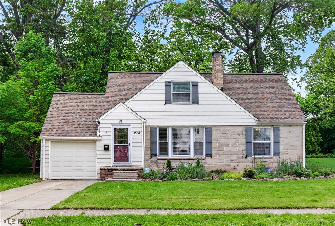 This charming 3BR 2BA home in S Euclid sits on a park-like yard with a stream running through the back of the property.  A quiet place to enjoy coffee in the morning and relax in the evening after a long day.  The living room provides a cozy feel with its recessed lighting, a fireplace for chilly days and built-ins for storage. Adjacent is the full dining room, which has plenty of space for dinner parties and its own built-in cabinet  Off of the living room is the colorful kitchen on one side and a screened-in porch on the other. There is a full bath and two nicely sized bedrooms on the first floor.  One with an 8 foot picture window that allows much natural light and scenic views.  The second floor includes a bedroom with recently installed skylights for increased natural lighting and a second room that can serve as a dressing room or office.  The second full bathroom, which includes a closet, is also on this floor.  Recent years have brought many updates, including a newer roof with a 50 year warranty (2019); electrical box (2018); hot water heater (2023) and a front garden with many native plants and ornamentals designed to attract pollinators and provide natural beauty.  The seller is providing a one-year home warranty for peace of mind.  This home is centrally located near many shops and restaurants, and it's only a quick drive to University Circle, the Cleveland Clinic, CWRU and all of the cultural amenities that area offers.