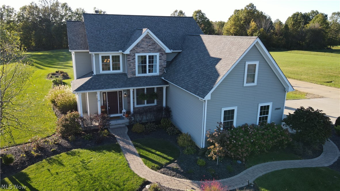 This custom home is move in ready! 4 bedrooms plus a bonus room with 2.5 baths on 2 acres. The entrance boasts a bright 2 story foyer with wood flooring that extends into the dining area. The living area includes a beautiful stone fireplace and lots of room to relax. Upstairs you will find 4 bedrooms and a bonus room area off the master bedroom perfect for a sitting or workout area.  The eat in kitchen includes all appliances. The unfinished basement is plumbed for an additional full bath and also includes a newer tankless water heater . Outside amenities include a large yard for entertaining and a deck with pergola. Call today to schedule you private showing, this one won't last!