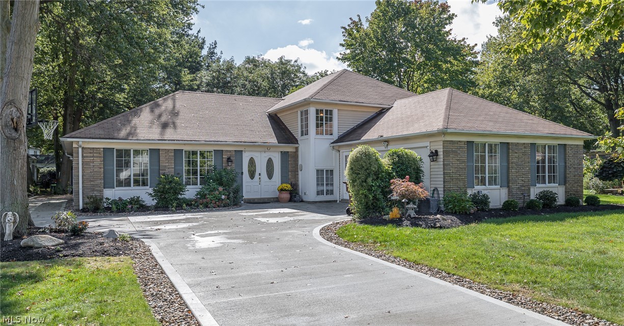 Welcome Home to this impeccable 4 bedroom split level nestled in the heart of Westlake. You will fall in love with the open concept and all of the amazing improvements and upgrades this home has to offer. This remodeled home awaits to be called home, and has all new upgraded bathrooms and kitchen along with newer concrete and flooring throughout. Some other amazing upgrades are newer furnace and AC unit, knew her patio door, newer landscape lighting and a newer outdoor shed. The lower level offers an additional fourth bedroom which could also be used as a workout room or a large office space.  Enjoy family gatherings in the updated kitchen with all new stainless steel appliances overlooking the spacious family room with custom stone fireplace. You would love entertaining your guests in a gorgeous private backyard with newer patio and covered pergola. A one year home warranty is offered for peace of mind. Call today for a private tour.