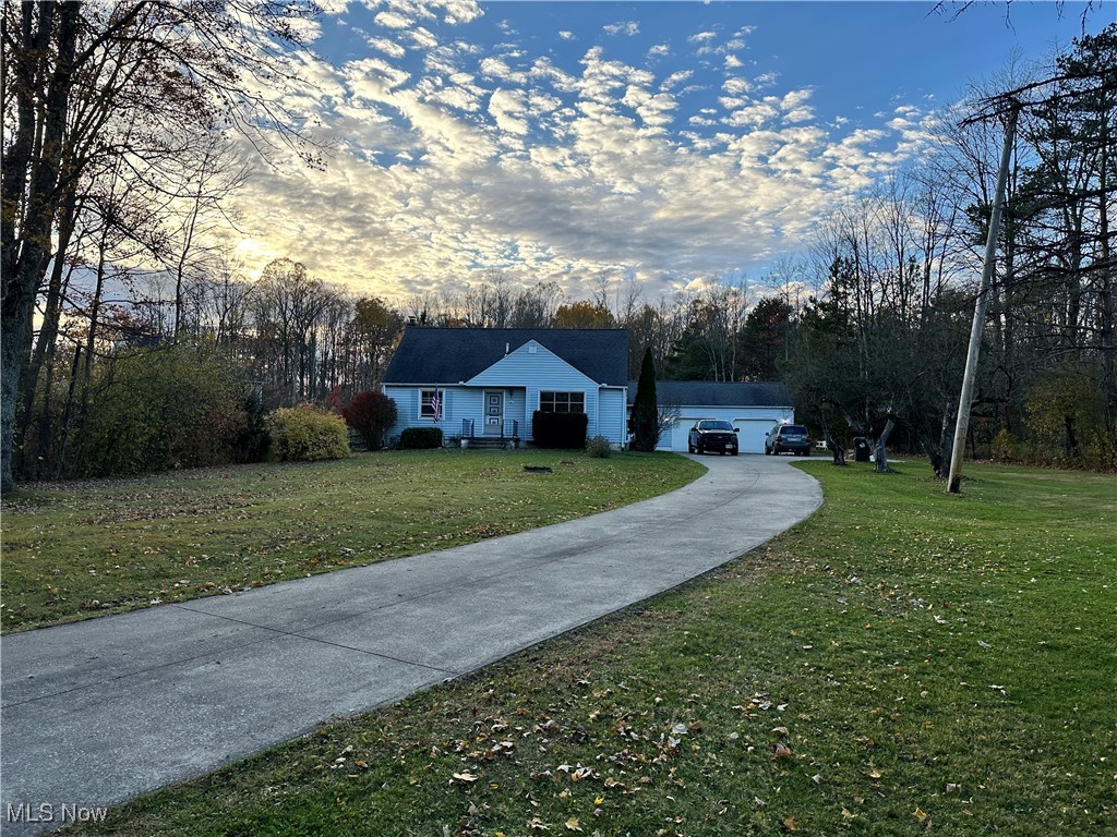 Incredible potential for anyone looking to renovate! Over 2300 square feet in this 3 bedroom home with expansive 22 x 22 great room with a wood-burning fireplace, full basement, garage, and barn (w/electric) on 1.72 partially wooded/open acres in the Aurora School District! Main floor living has 2 bedrooms, a bathroom, living room, and kitchen with stainless steel appliances. Second floor has the third bedroom with built-in drawers, a sitting area, and a room with built-ins (ideal for an office or playroom!). Property is landscaped, driveway is concrete, part of the rear yard is fenced-in and has raised garden beds. Updates include furnace/air conditioning (2024), tying the home into gas at the street, and reverse osmosis system for kitchen and indoor bar. This home will be selling AS-IS, seller will not make any corrections but will escrow $16,500 for the septic. Investors and DIYers welcome! Bring your fresh ideas and make it your own!