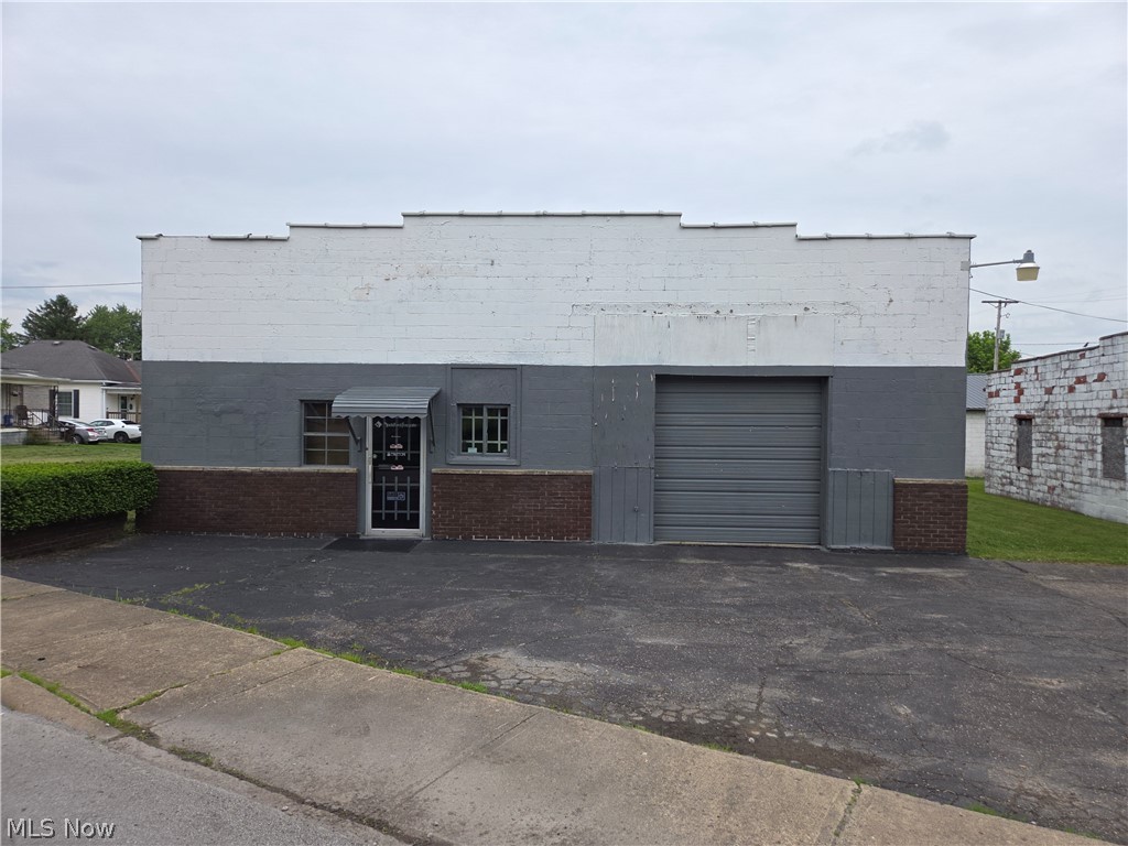 Here is your chance to own a Cambridge icon. Complete turnkey business. There are two buildings on the property There is a 36' x 49' building with 1764 sq ft. A second building, 62' x 43' building with 2,666 sq ft. This building offers a showroom, office, restroom, mechanics bay, overhead chain hoist and a new roof installed 5 years ago. Heated with radiant gas heaters. All inventory transfers except for the owners' personal items. Tools will transfer. A 1952 Coke machine, a Herring and Hall Safe, counters, signs, a 175,000 BTU furnace which is not hooked up. Computers, 1907 antique cash register, deer mounts, barrels of Cambridge collectable glass, Sam's photofax, capacitors, amplifiers, speakers, too many items to list. Estimated value of the inventory collectables and tools is valued around $40,000 alone.
