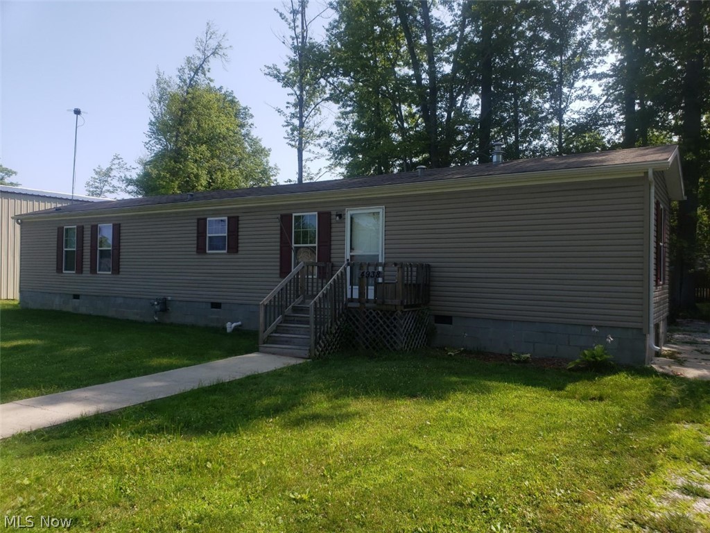 2014 2 bed 2 full bath home no more than 100 yds to Lake Erie. What a gorgeous setting and area to reside in. This home features an updated kitchen, 1st floor laundry, master bedroom with master bath that includes an oversized tub and shower. 2nd bed is located at opposite end of home with its own full bath. Huge concrete patio and over hang just installed in 2018 which enters thru dining room into the back yard. Property is over a half acre on a dead end street. A gate in fence allows you to walk to Lake Erie and Old Lake Rd within 1 minute. Also Geneva State Park is a 2 minute walk which includes numerous activities including a walking/bike trail. Simply Beautiful. Please note the 5 yr old pole building that is 45 x 50 that can store your boats, RV's, toys, etc... Super property !!!