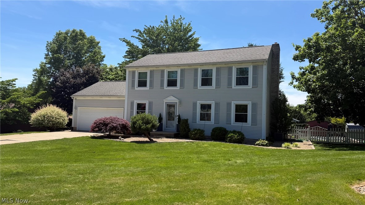 For Sale: 2394 Sesame St NW, Mogadore, OH 44260 | 4 Bedrooms | 2.5 Bathrooms | 2,212 sq ft | .39 Acres Welcome home to this spacious two-story residence located in the Lake Local District. Situated on a generous 0.39-acre lot, this well-maintained 4-bedroom, 2.5-bath home offers over 2,200 sq ft of comfortable living space with room for everyone to spread out and enjoy. Inside, you'll find a functional floor plan designed for everyday living and entertaining. The partially finished basement provides additional flexible space perfect for a recreation room, home office, fitness area, or playroom. Upstairs, four generously sized bedrooms offer plenty of space for family and guests. Step outside to enjoy the fully fenced backyard, ideal for family, play, gardening, or outdoor gatherings. One of the property's standout features is the heated workshop located behind the garage—perfect for hobbyists, craftspeople, mechanics, or anyone needing year round workspace.