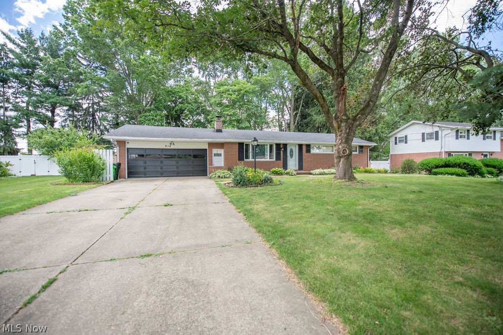 Welcome to 916 Marion Ave in Massillon—a charming 3-bedroom, 2-bath ranch that blends comfort, versatility, and inviting living spaces both inside and out. Step inside to a bright and functional layout designed for everyday living. The main living areas feel warm and welcoming, while the three bedrooms and two full bathrooms provide plenty of space for guests or your own personal retreat.

The home also features a sunroom with its own heating system and mini-split, offering additional flexible space that can be used year-round to suit your needs. The partially finished basement expands your living space even further and is currently set up as a movie room—perfect for cozy nights in or entertaining. An additional lower-level room offers flexibility and could easily serve as a fourth bedroom, home office, or workout space depending on your needs.

Outside, you'll find a fully fenced backyard with a privacy fence, creating a peaceful setting for relaxing or entertaining. The spacious patio is ideal for grilling, hosting gatherings, or simply enjoying a quiet evening outdoors. For added peace of mind, the home will be sold with a home warranty, giving you extra confidence as you settle in. Conveniently located near shopping, dining, parks, and everyday amenities, this move-in-ready home offers the perfect balance of comfort, flexibility, and location.