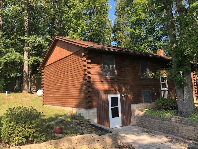 First time to be offered on the market!  The warm, honey-hued logs will make your family feel relaxed and guest at ease.  Now is the chance to make this 3 bedroom, 2 bathroom log home  on 2.5 acres your own.  The location is great to feel rustic yet an easy drive to town.  Salt Fork is just a few minutes away for outdoor activities and boating.  Walk out basement, detached garage, pole barn, storage barn. This property has been well cared for and offers a move-in ready home!