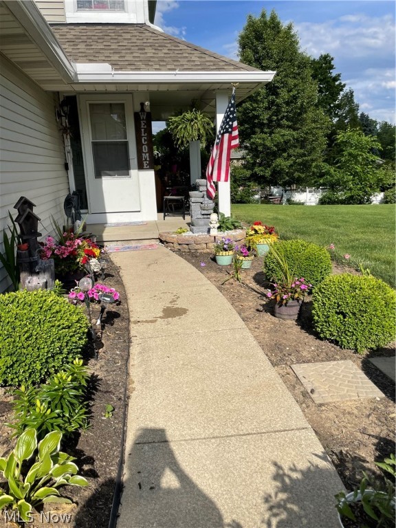 A remarkable Wrens Crossings Townhouse with 2 bedrooms, 1 full, and 2 half baths.  This end unit features an awesome side porch, and a private deck, with both overlooking a peaceful pond.  The open concept has open staircases highlighting the large living room and kitchen.  A finished basement is a family room/rec room, 1/2 bath, and laundry room.  The large bedrooms are upstairs with the full bath.  An attached garage, ample parking, easy access green space, and so much more.