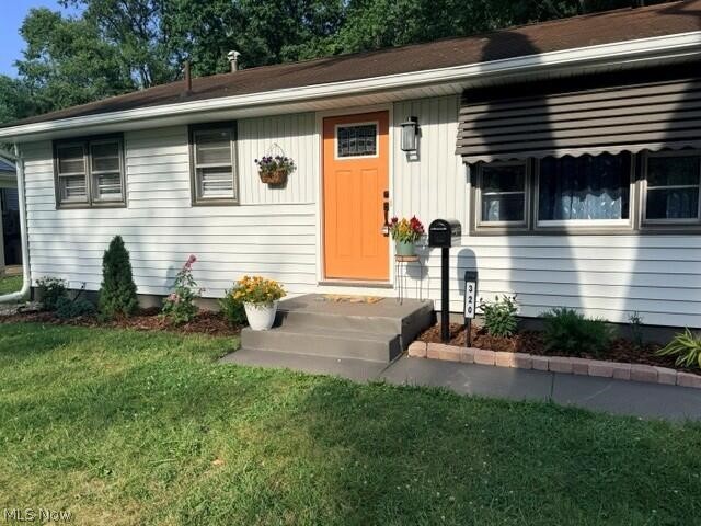 Modernized ranch home with perfect blend of character and charm in Perry Township neighborhood. Kitchen is completely renovated with soft close  cabinets, 6 burner gas cook top, stainless refrigerator and dishwasher, quartzite counter and touchless faucet with quartz sink. Fully updated bathroom with stain master LVT flooring. All 3 bedrooms have new stain master carpet with warranty. LVP flooring in kitchen and living room. Interior and exterior have been freshly painted. Enjoy evenings entertaining in the newly fenced backyard. Extra wide driveway allows for ample parking. Move-in ready!