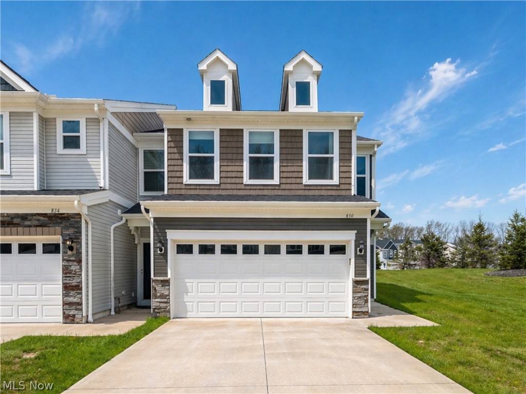 This GORGEOUS and IMPRESSIVELY UPGRADED end-unit townhouse is ready for its next chapter.
Upon entrance, be welcomed with open-concept 9' ceilings throughout the main level, with gorgeous 6-foot tall windows.
Includes an additional gathering room with many extra windows for generous natural light which are exclusive for end-units, plus luxury vinyl plank flooring and upgraded carpet in both 1st and 2nd floor.
Master suite extension includes a sitting room with breathtaking WATER VIEW, deluxe master bath with quartz countertop, oversized walk-in, private enclosed toilet, luxury shower & semi-frameless shower door with tiles on both floors and walls.
The 2nd floor bathroom also comes upgraded to have separate rooms between vanity and toilet & bath plus upgraded laminations.
The gourmet kitchen includes qaurtz countertop, SS appliances and maple cabinetry with soft-close dovetail drawers & doors and double roll-out trays.
Other upgrades include ceiling fan pre-wire, smart-home garage door with wi-fi capabilities with a 240V; 50 amps outlet for EV installed. The washer & dryer, blinds and curtains will also stay in the unit.
Don't miss this opportunity to take advantage of some incredible incentives and to live in this beautiful low maintenance townhome community just 1 mile from Lake Erie, 5 minutes to Crocker Park, and quick access to I-90. Schedule your showing today!