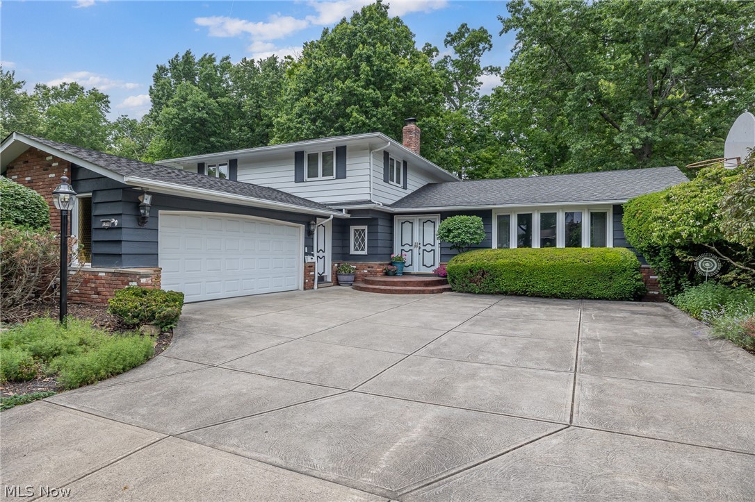 This immaculately maintained 5 bedroom 3 full bath home is looking for you. The main floor features an oversized living room with newer bay window, formal dining room and large eat in kitchen featuring new double ovens and a U shaped corian counter providing tons of working area as well as lots of storage. The kitchen's dining area over looks the massive family room with wood burning fireplace with heatilator. Off the family room is a full bath, laundry room, and bedroom which makes a great home office. The second floor boast 4 additional bedrooms including the master bedroom, jack and jill en suite bathroom and additional full bathroom. In addition to all that space the basement features a large finished rec room as well as additional storage. The newer sliding doors off the family room overlook an amazing landscaped private back yard featuring custom tiered deck, classic rock retaining walls, raised garden and built in firepit. The amazing walk way and firepit area feature reclaimed cobblestones from the historic lakeside avenue in Cleveland. The Deck includes a built in gas grill and plenty of seating. The original owner ran the lumber yard for Forest City and hand picked all the lumber that went into the house, which was built by Fireside Builders, a well known local builder who lived next door, so the quality of this build is impeccable. Updates include furnace, air, and hot water tank approx 2015, roof in 2012 with GAF Timberline 45 year shingles, electric panel in 2011, and bay window and slider 2010