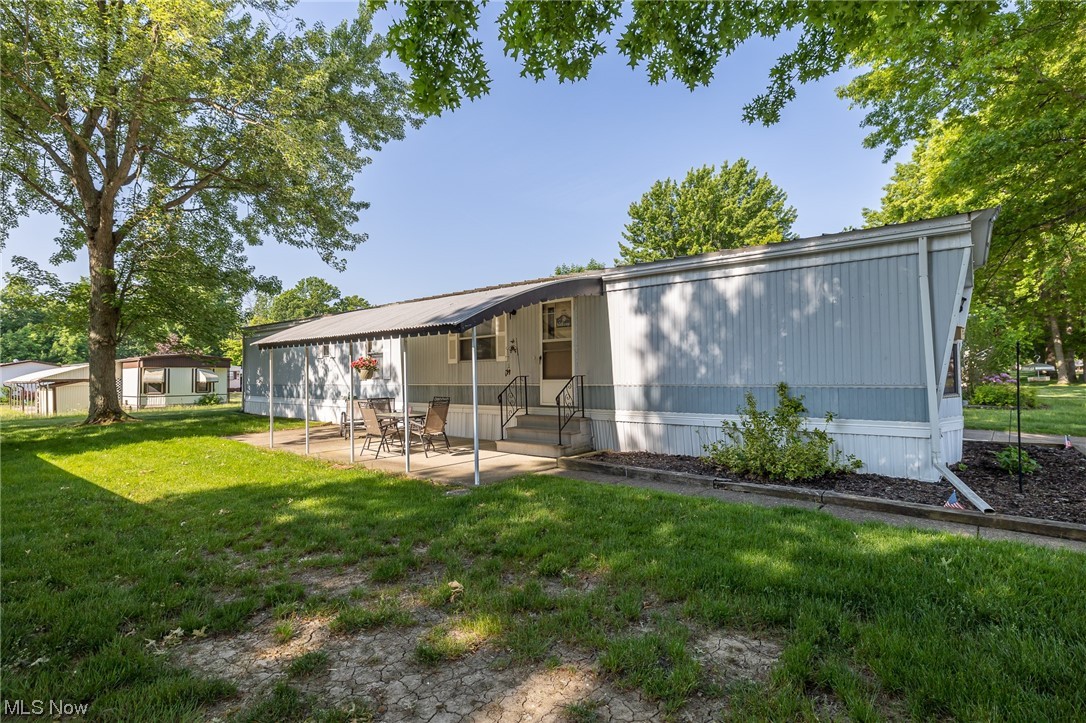 COLUMBIA PARK IS A 55 AND OLDER CONCEPT OF LIVING and is Ohio's Premiere Adult Land Lease Community! Amenities include: Gatehouse managed entrance! On site Shopping Plaza! On site Management! Walking Path/Dog Walking Path! Shuffleboard! Bocce Ball! Library! Crafts, and Social Hall! 
WELCOME HOME TO this nicely maintained 1982 Schult Singlewide Manufactured home offering 980 sqft. (70 x 14) featuring 2 bedrooms, 1 bath, formal living room and a large eat in kitchen along with a laundry area.  If your dream is to have a large kitchen, you will fall in love with this one.  This home has the metal style roofing.  The HVAC System is serviced annually .  The windows are the originals, not sure of the age of the hot water tank.  This home is HOME the moment you walk in.  Why not set up your apt. today.....