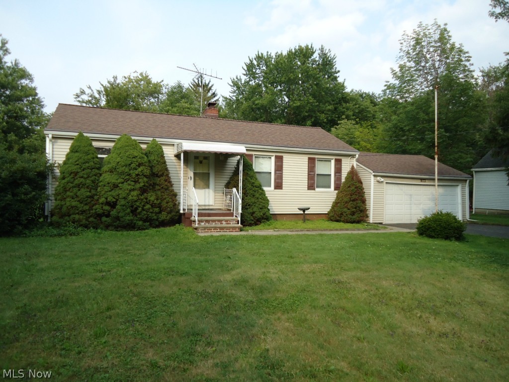 Looking for a great value?  Stop looking!  Well maintained ranch on 1+ acre lot.  Big living room with wood burning fireplace and hardwood floors.  Spacious kitchen with pantry and built-ins.  Enclosed screen porch overlooking the park-like backyard.  Updates include vinyl siding, electric svc, furnace, central air conditioning, dimensional roof and vinyl replacement windows.  2 car garage and 2 Amish built storage barns (12x12) included.  Call today for your private showing - you won't be sorry!
